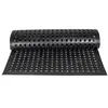 A black rubber mat with a perforated pattern is rolled up on one end and laid flat on the other. Podgląd zdjęcia produktu