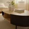 CALICOSY - Table basse ovale avec flancs en métal noir L120 Voir les images du produit 4