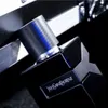 A close-up shot of a black Yves Saint Laurent perfume bottle with a textured silver cap and a blue accent. Náhled obrázku produktu