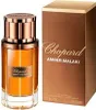 A bottle of Chopard Amber Malaki perfume and its packaging are displayed against a white background. Voir les images du produit