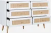 A white dresser with rattan drawer fronts and wooden legs. Produktbild-Vorschau