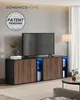 A modern living room with a TV stand and a television. Náhled obrázku produktu