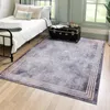 A bedroom scene with a bed, a rug, and a trunk. Náhled obrázku produktu