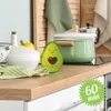 A kitchen counter with various items including a timer, pots, and bowls. Voir les images du produit