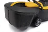 Close-up of a black and yellow lawnmower grass catcher with a wheel visible. Produktbild-Vorschau