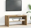 A TV stand with a TV mounted above it, in a room with a plant. Náhľad obrázku produktu