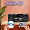 A retro boombox with a CD and cassette player, along with a CD and cassette tape, displayed on a shelf. Produktbild-Vorschau