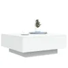A white coffee table with a small potted plant and a cup of coffee on top, set against a white background. Anteprima dell’immagine prodotto