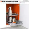 A pull-out cabinet organizer with kitchen items inside, shown within a cabinet. Anteprima dell’immagine prodotto