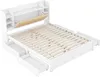 A white bed frame with drawers and shelves, shown from a diagonal angle. Náhled obrázku produktu