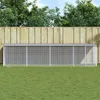 A long, narrow chicken coop with a roof, set up on a green lawn in front of a wooden fence and trees. Produktbild-Vorschau