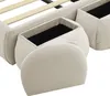A close-up view of the storage drawers and the bed frame of a beige upholstered bed. Produktbild-Vorschau