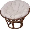 A papasan chair with a beige cushion on a white background. Produktbild-Vorschau