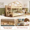 A wooden bunk bed with a house-shaped top bunk, set up in a child's room with toys and decor. Náhled obrázku produktu