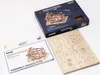 The image shows the packaging and components of a Robotime Marble Parkour 3D wooden puzzle kit. Produktbild-Vorschau