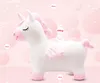 A plush unicorn toy with measurement indicators and weight limit. Náhľad obrázku produktu