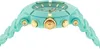 A side view of a turquoise and gold watch. Produktbild-Vorschau