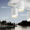 A close-up marketing image of white LED ceiling spotlights with descriptive text overlays, set against a backdrop of rocky islands and water. Produktbild-Vorschau