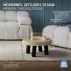 A living room scene with a sofa and a coffee table. Náhľad obrázku produktu