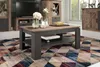 A modern living room with a coffee table, rug, and entertainment center. Podgląd zdjęcia produktu