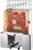 A commercial electric orange juicer with a transparent container filled with oranges. Anteprima dell’immagine prodotto