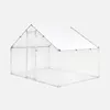 A white chicken coop with a green frame, set against a light gray background. Produktbild-Vorschau