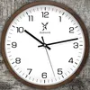 A close-up of a wooden wall clock with a white face and black hands, set against a textured gray background. Voir les images du produit