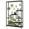 A multi-tiered black metal plant stand filled with various potted plants and hanging terrariums. Náhľad obrázku produktu