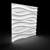 A white 3D wall panel with a wave-like texture is displayed against a black background with a subtle shadow. Podgląd zdjęcia produktu