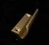 A close-up studio shot of a bronze-colored door handle against a black background. Produktbild-Vorschau