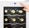 A finger is shown pressing a button on the top control panel of a wine cooler, with bottles of wine visible inside. Produktbild-Vorschau