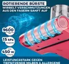 Close-up marketing image of a red handheld vacuum cleaner with blue swirling graphics indicating suction and rotation, highlighting its features. Produktbild-Vorschau