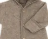 Close-up view of a beige baby overall. Produktbild-Vorschau