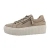 A side view of a beige women's sneaker with a platform sole. Produktbild-Vorschau