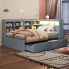 A child's bedroom with a daybed, shelves, and drawers. Produktbild-Vorschau