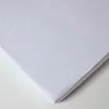 A close-up view of a white mattress protector. Produktbild-Vorschau