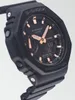 Close-up of a black G-Shock watch with rose gold accents. Voir les images du produit