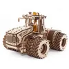 A 3D wooden model of a tractor on a white background. Produktbild-Vorschau
