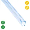 A close-up, angled view of a transparent shower seal strip with blue accents, set against a white background. Icons indicating cutting tools are present. Náhled obrázku produktu