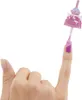A hand is shown applying nail polish to a fingernail. The nail polish bottle has a decorative cap shaped like a pink cupcake. Podgląd zdjęcia produktu