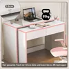 A white desk with pink trim, featuring a laptop, a cup of tea, and a book. A pink office chair is partially visible. Podgląd zdjęcia produktu