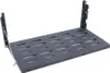 A black metal folding table with a slatted surface, attached to two vertical brackets by cables. The table is shown against a white background. Náhled obrázku produktu