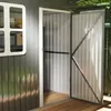 Exterior view of a dark gray metal shed with an open door and a window. Produktbild-Vorschau