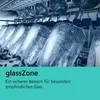 Close-up of wine glasses in a dishwasher rack, with marketing text below. Produktbild-Vorschau