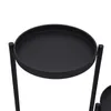 A close-up view of a black, multi-tiered plant stand. Podgląd zdjęcia produktu