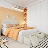 A child's bedroom with a bed, wardrobe, and decorative elements. Náhled obrázku produktu
