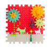 A colorful set of building blocks with gears and animal figures arranged on a white background. Podgląd zdjęcia produktu