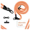 A product shot of an orange lanyard with black clasps and accessories, presented on a white background. Produktbild-Vorschau