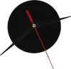 A close-up of a black clock with red hands. Náhľad obrázku produktu