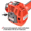 Close-up of a red and black gasoline-powered trimmer engine with text overlay. Produktbild-Vorschau
